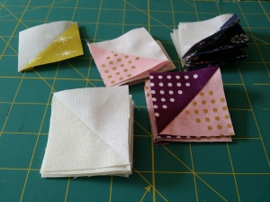 Lovely little (2 1/8") HSTs sewn from Cotton and Steel fabrics.